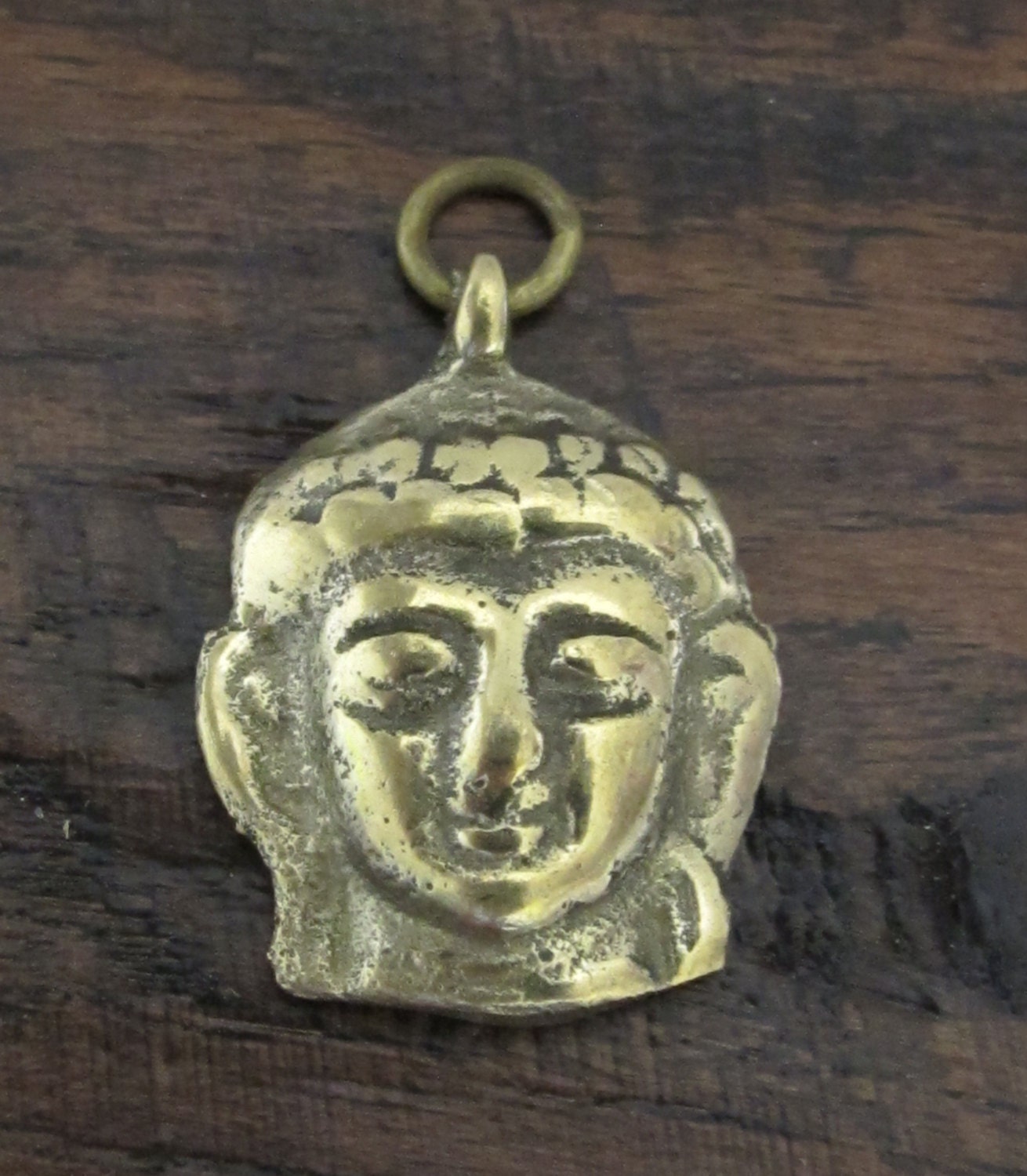 Tibetan Buddha face pendant from Nepal - CP043