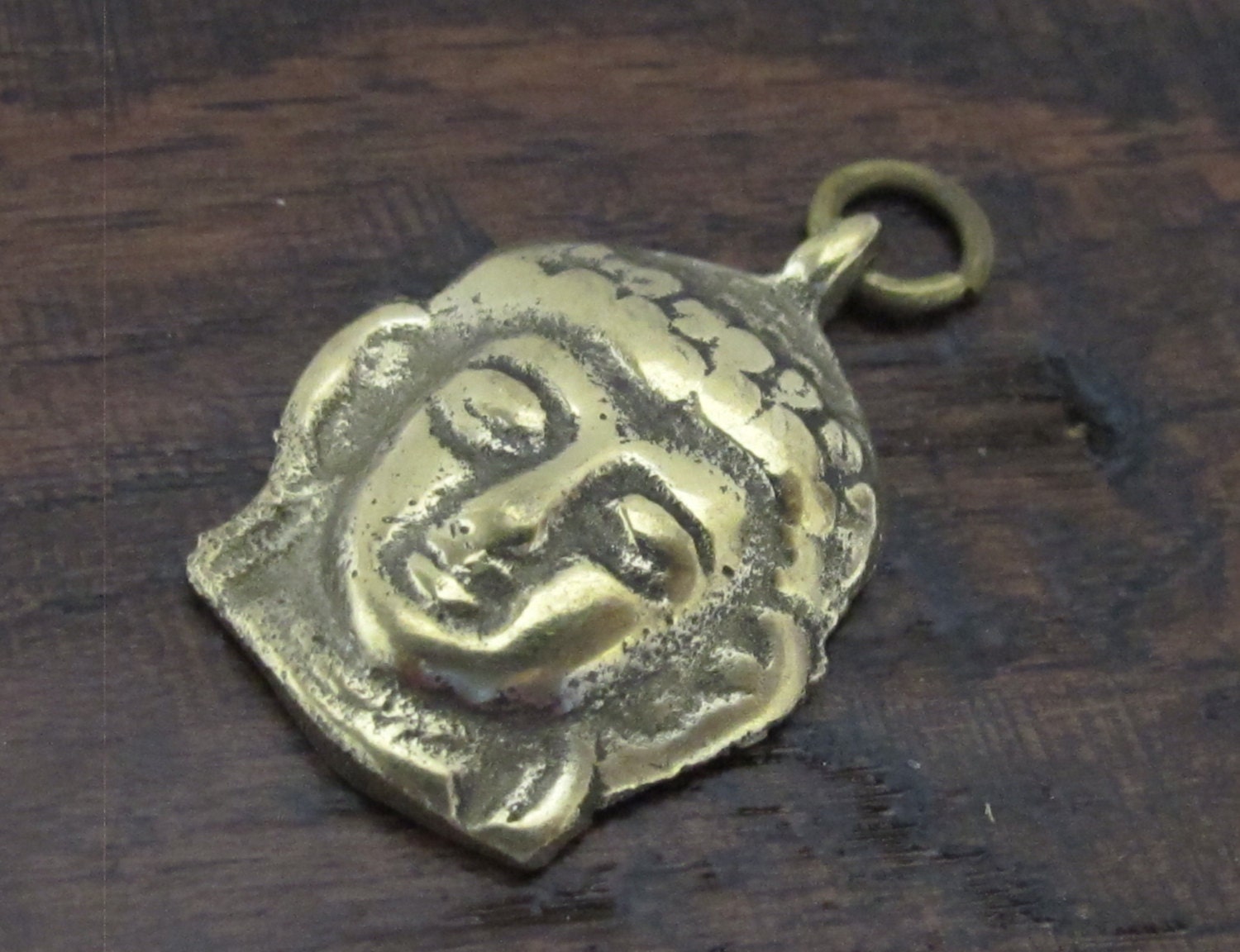 Tibetan Buddha face pendant from Nepal - CP043