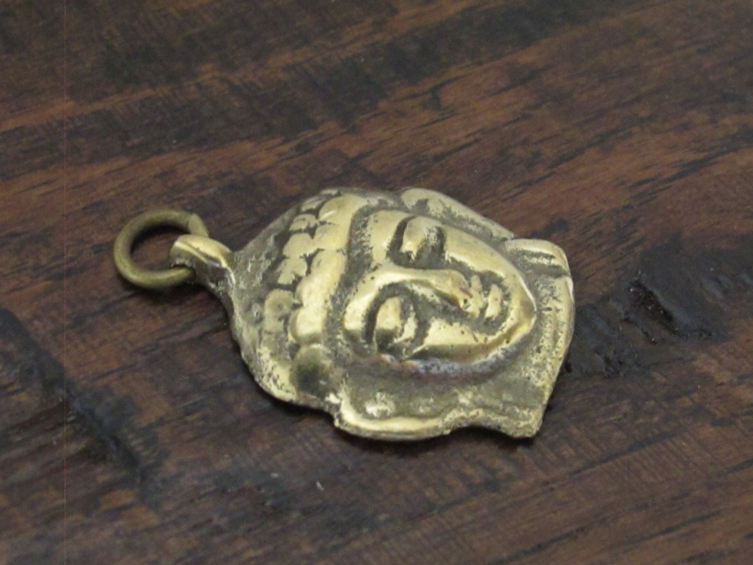 Tibetan Buddha face pendant from Nepal - CP043