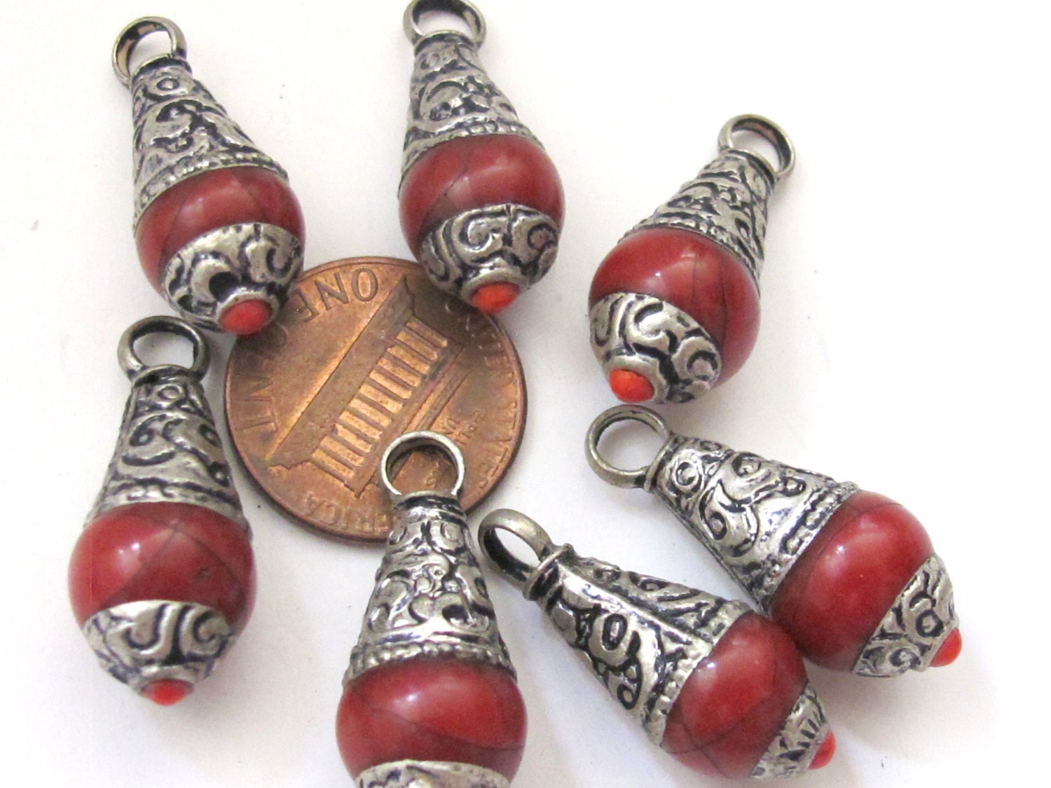 Tibetan silver red crackle resin small size pendant with floral design on bail - PM209D