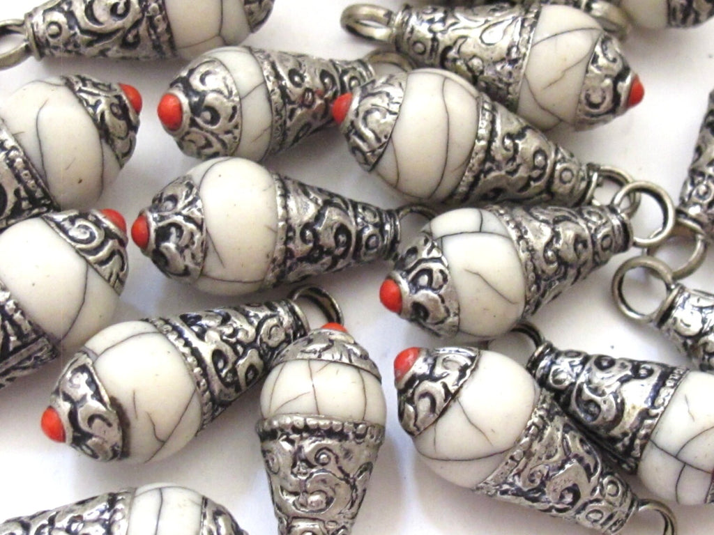 Tibetan silver cream white crackle resin small size pendant with floral design on bail - PM209E