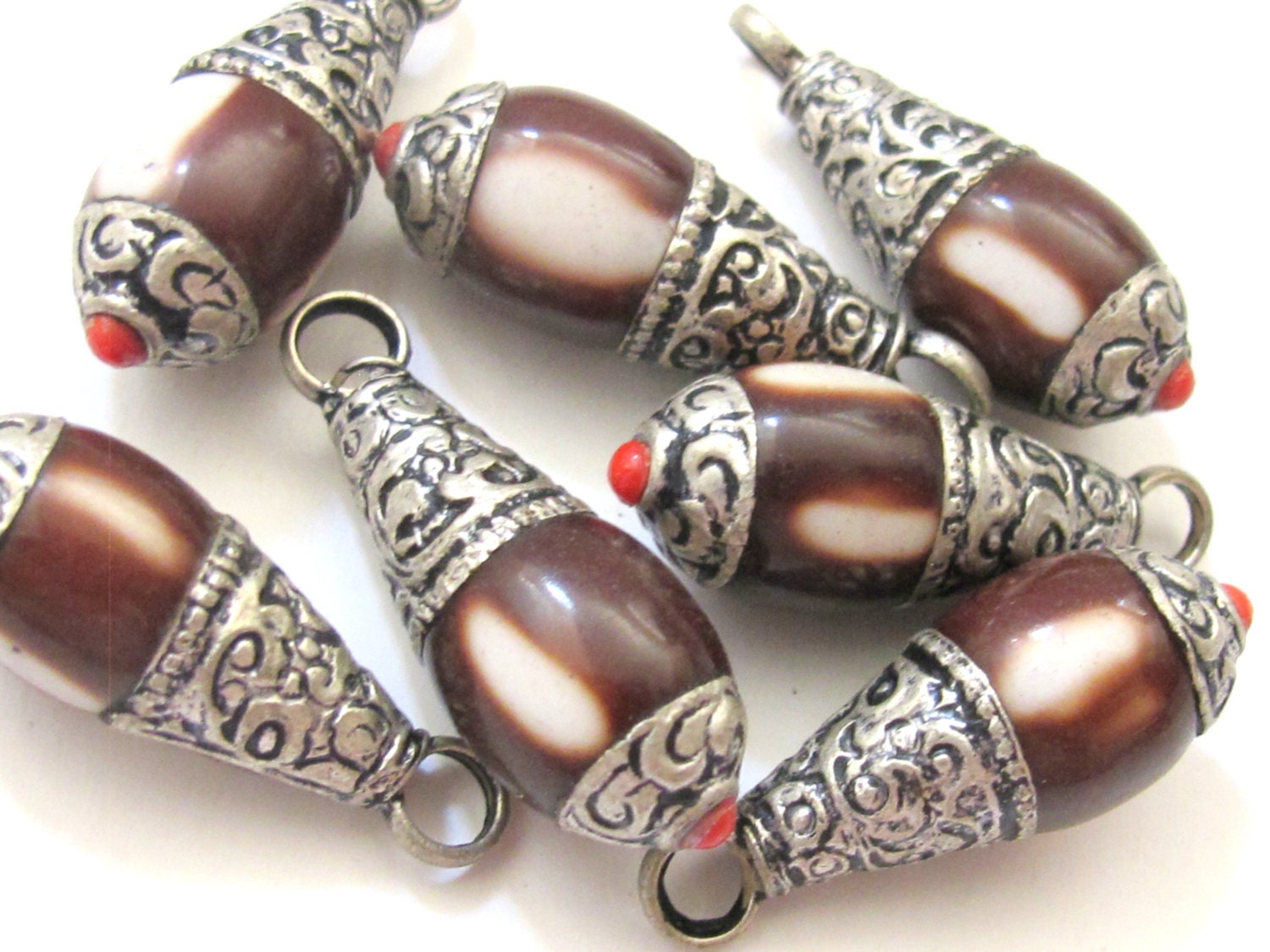 Tibetan silver brown resin small size pendant with floral design on bail - PM209G