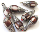 Tibetan silver brown resin small size pendant with floral design on bail - PM209G
