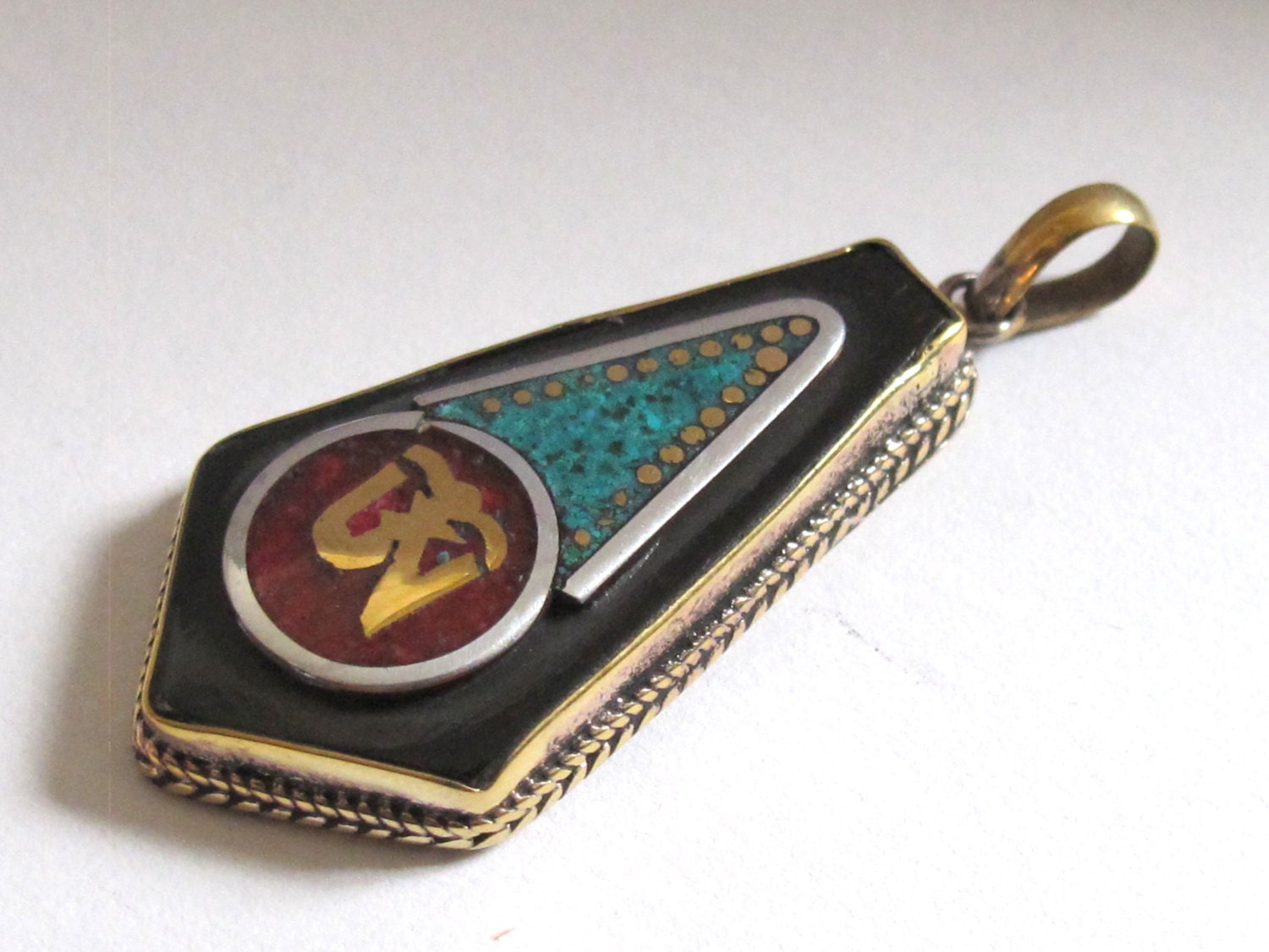 Tibetan arrow head shape Om brass pendant with turquoise coral inlay - PM219A