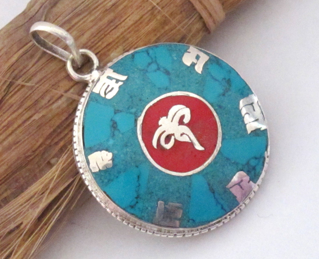 Tibetan silver om Buddha eye pendant with turquoise inlay - PM220G