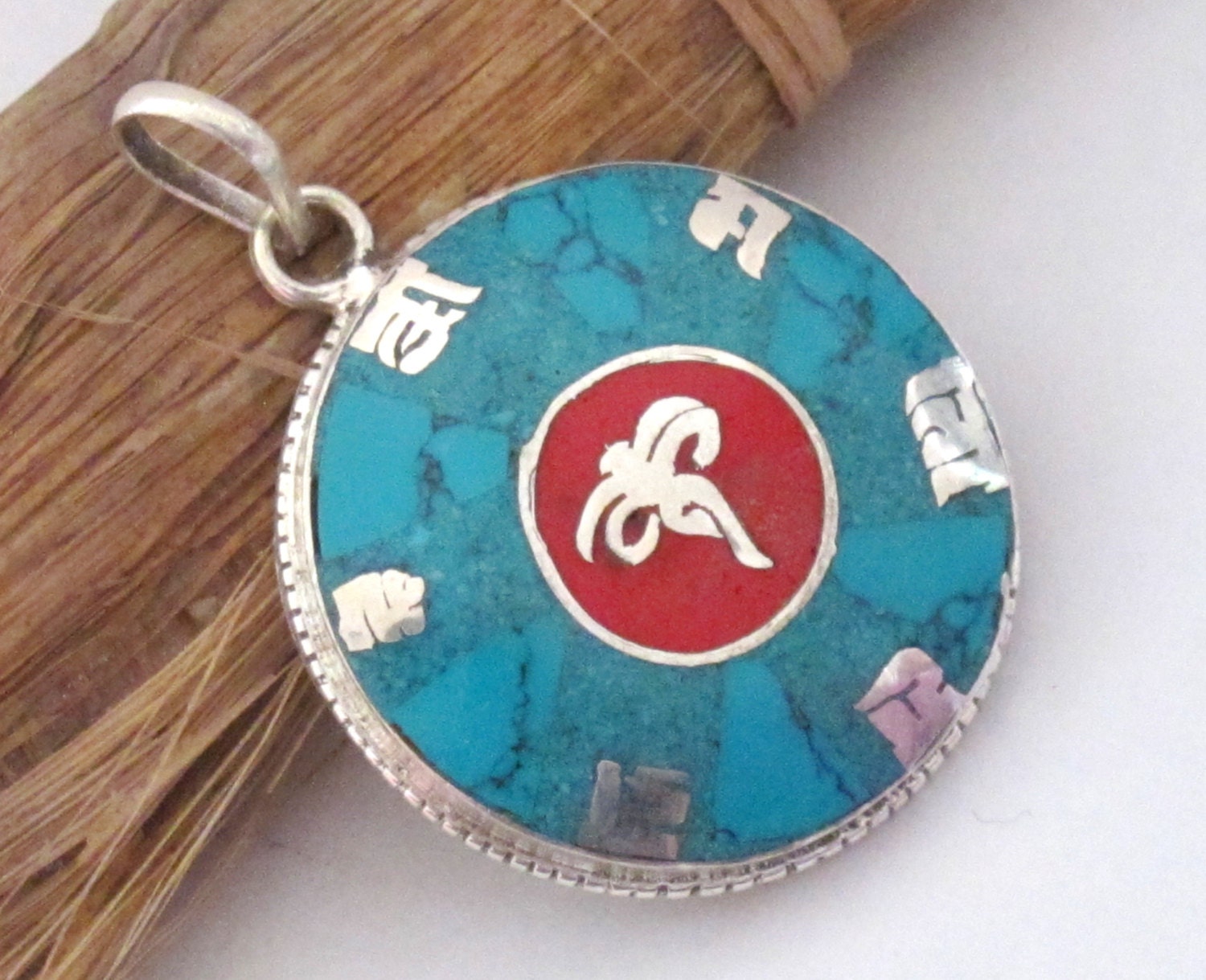 Tibetan silver om Buddha eye pendant with turquoise inlay - PM220G