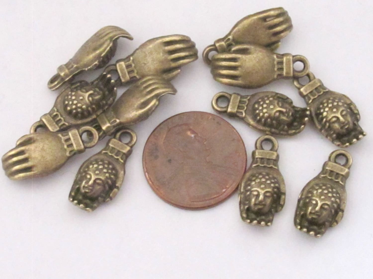 5 pieces- Brass tone Buddha Hand charms - BD443B