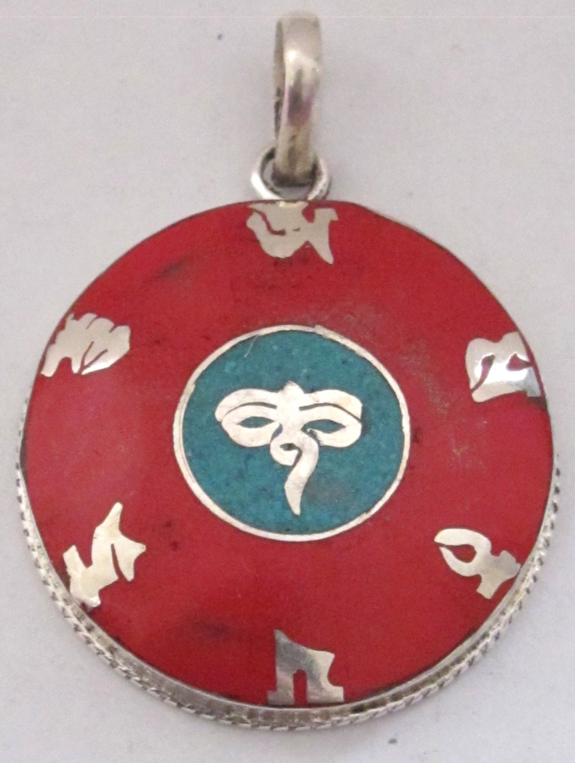 Tibetan silver om Buddha eye pendant with coral and turquoise inlay - PM220H