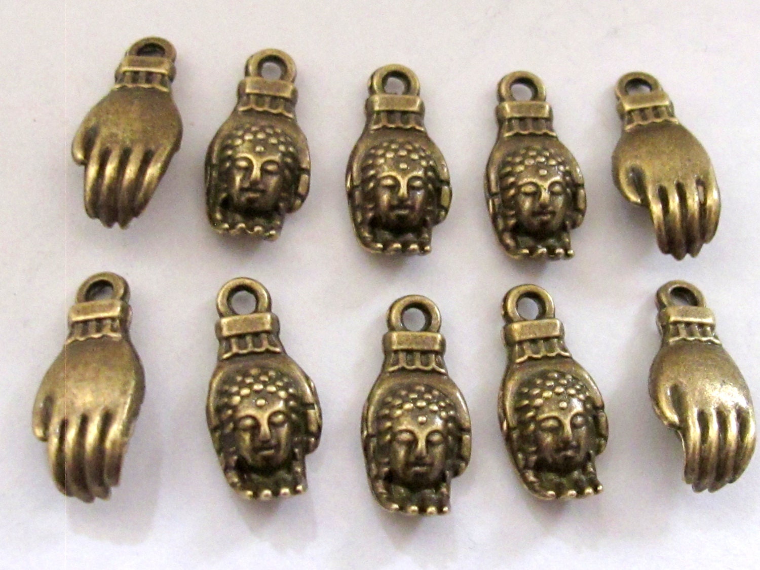 5 pieces- Brass tone Buddha Hand charms - BD443B