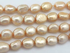 20 BEADS - Lustrous champagne color genuine freshwater cultured pearls - PL028