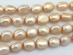 20 BEADS - Lustrous champagne color genuine freshwater cultured pearls - PL028