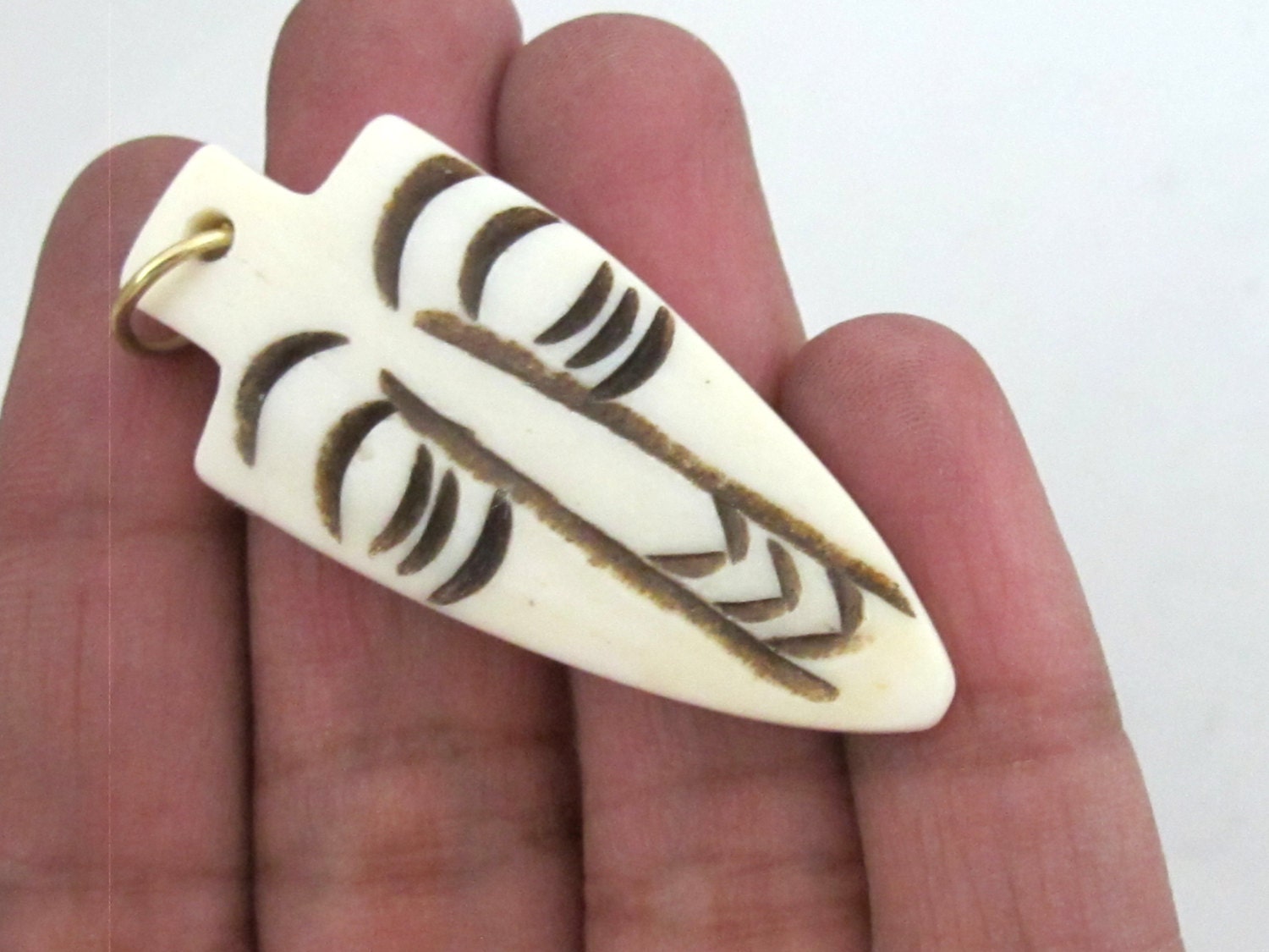 Carved recycled cattle bone color tribal Face pendant arrowhead shape - 1 Pendant - PB076