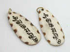 Carved recycled cattle bone Tibetan Om mantra inscribed leaf shape pendant - PB077