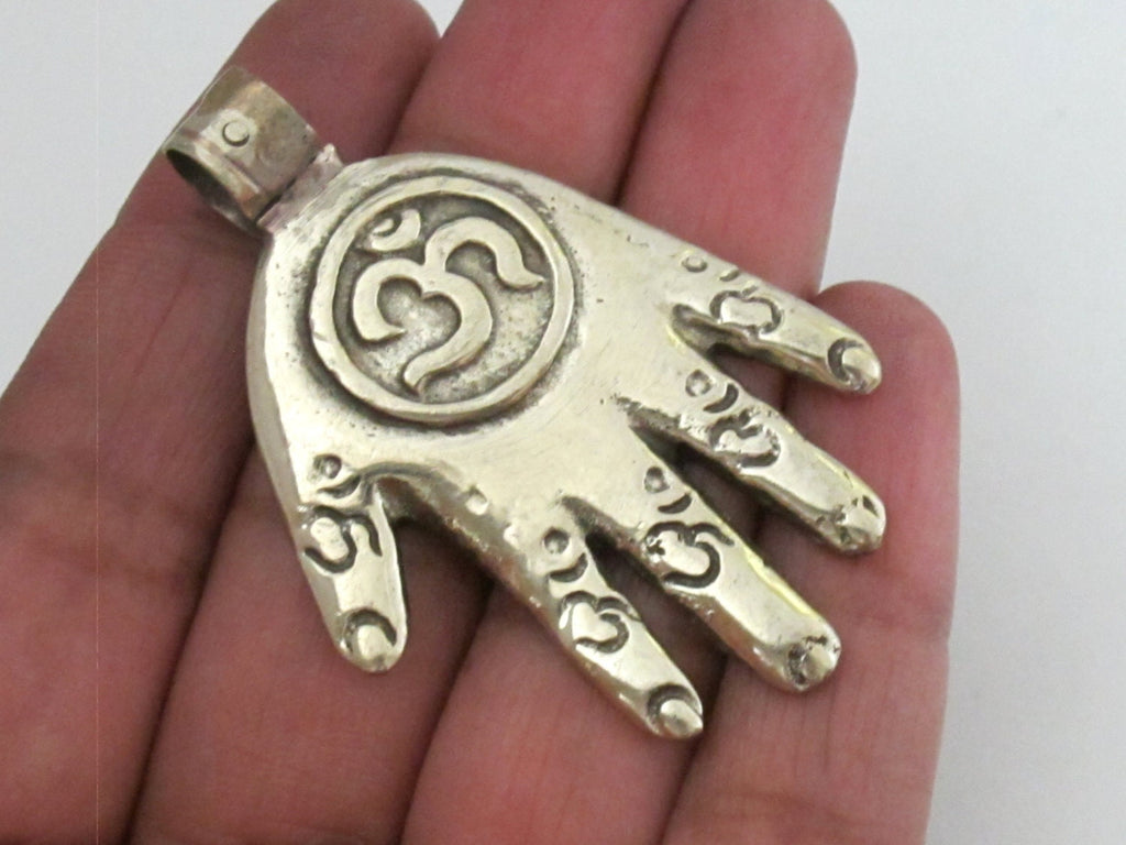 Reversible Tibetan silver Buddha hand Om pendant with Lotus floral details on the reverse side - PM233C