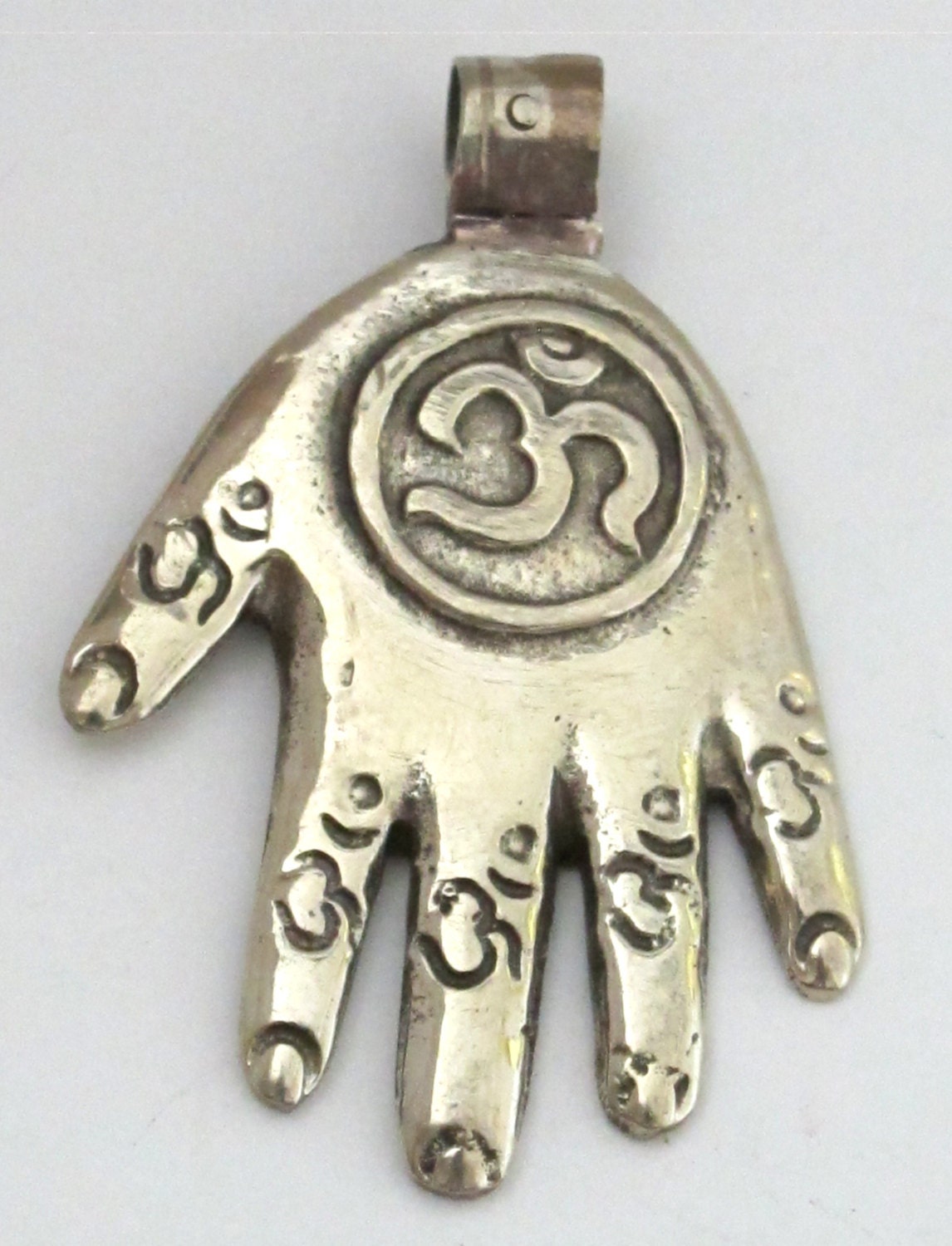 Reversible Tibetan silver Buddha hand Om pendant with Lotus floral details on the reverse side - PM233C