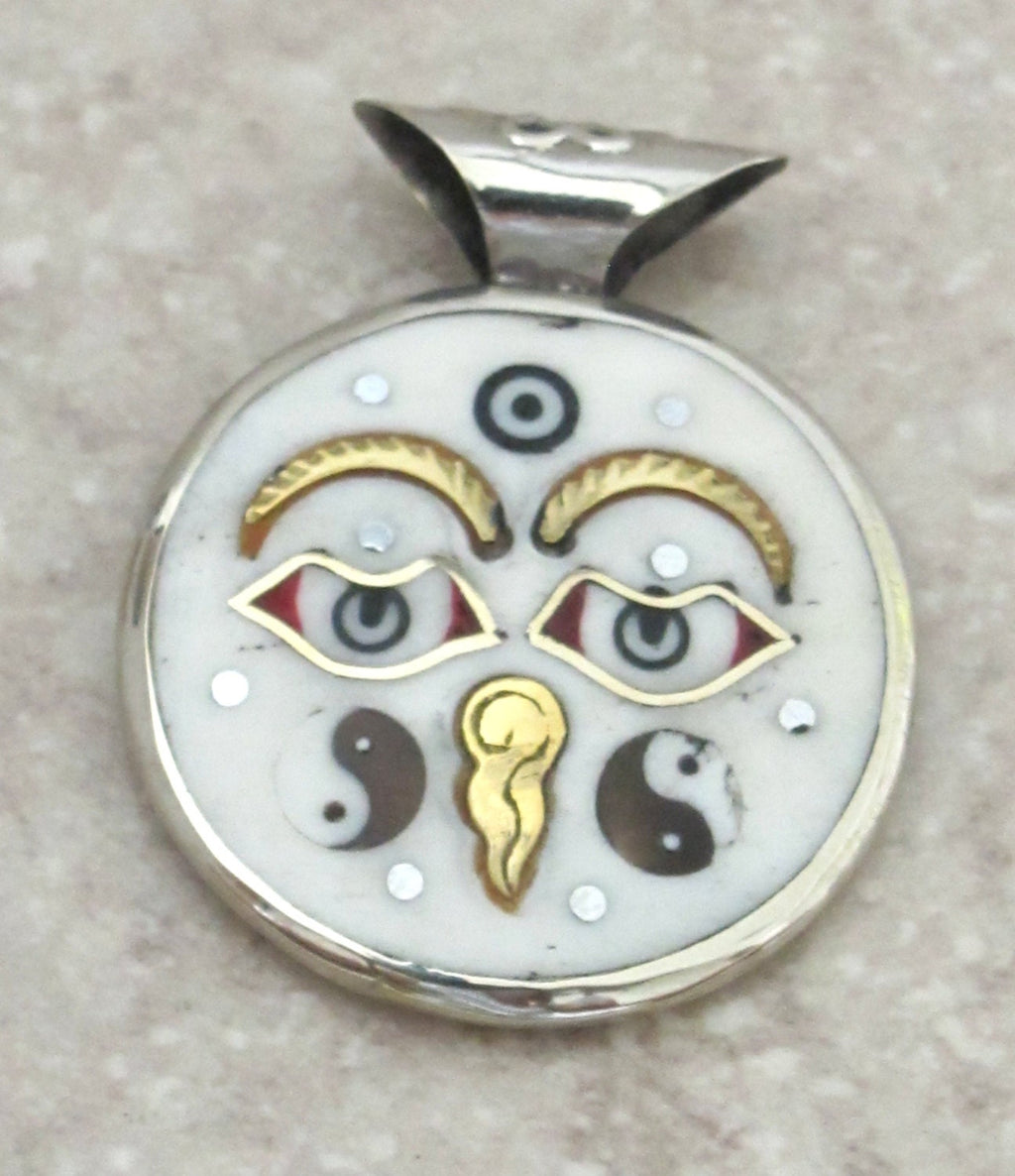 Reversible round cream color tibetan recycled cattle bone pendant with brass inlay, om mantra and buddha eye - PM236