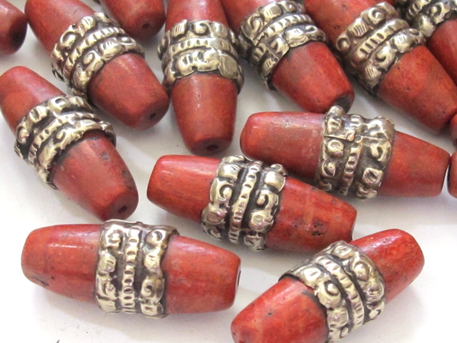 1 BEAD - Tibetan coral bead encased in tibetan silver band - BD591A