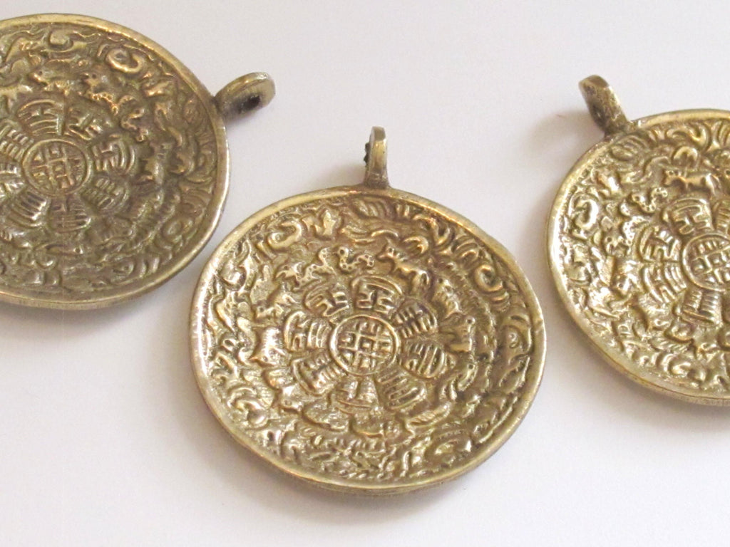 Tibetan Om with calendar timeline wheel Solid Brass pendant 50 mm height x 43 mm wide - CP051 custom design copyright Nepalbeadshop