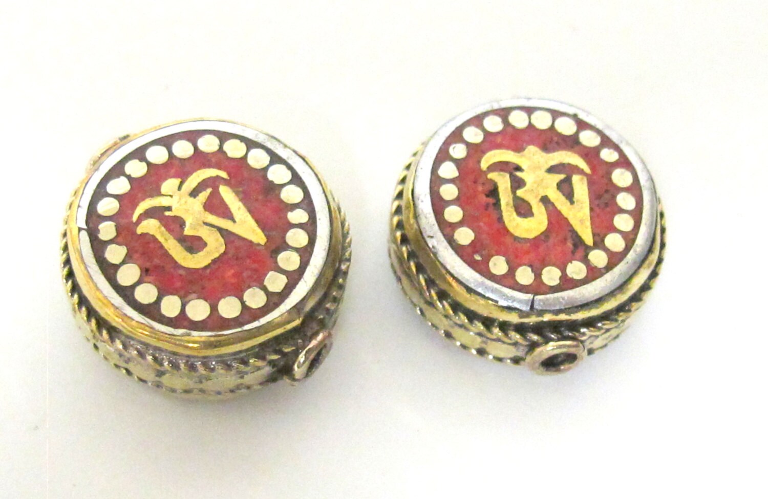 1 BEAD - Tibetan Om inscribed reversible brass bead with coral inlay - BD498C