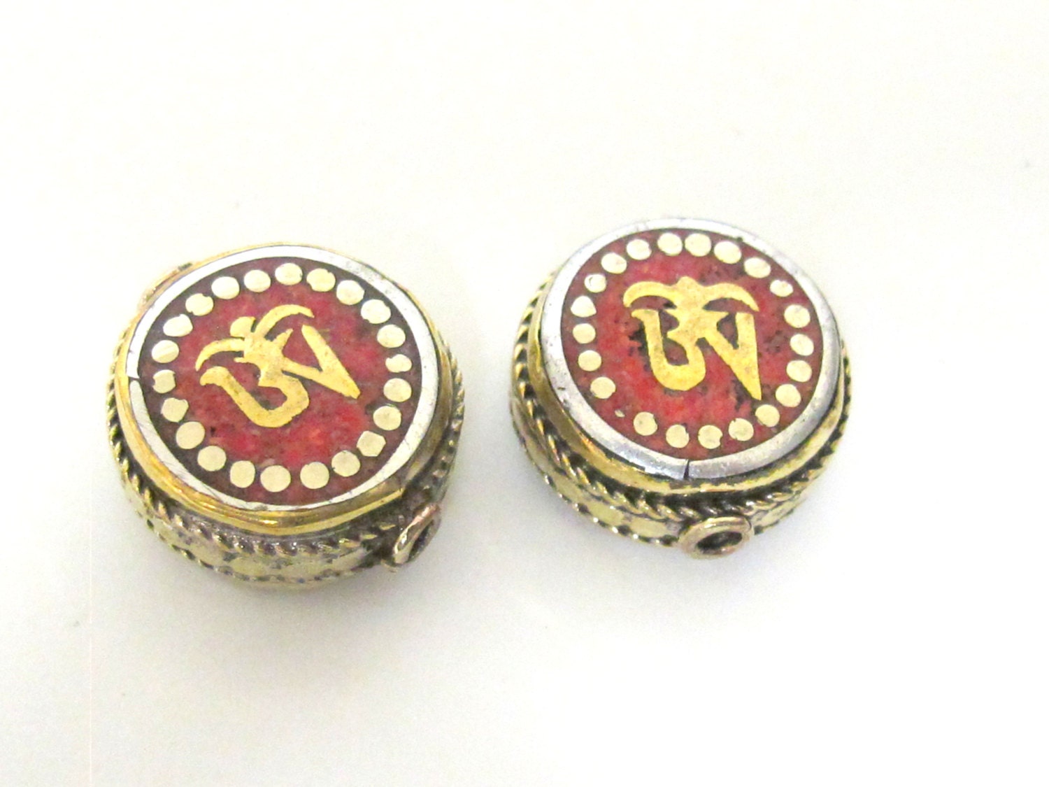 1 BEAD - Tibetan Om inscribed reversible brass bead with coral inlay - BD498C