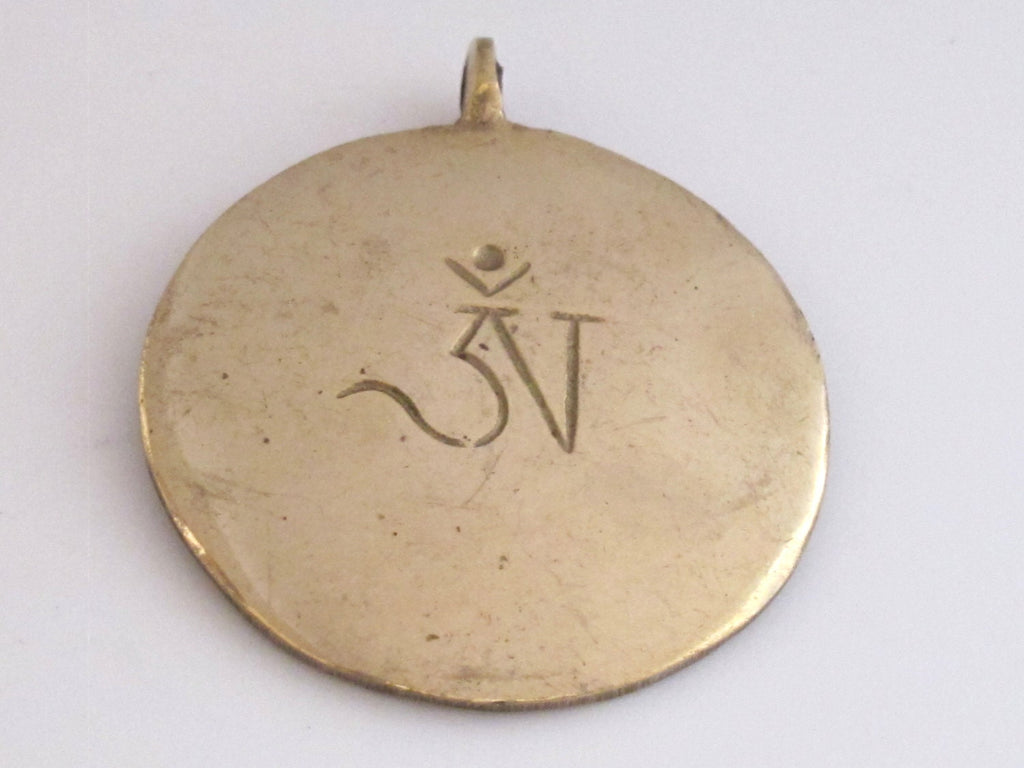 Tibetan Om with calendar timeline wheel Solid Brass pendant 50 mm height x 43 mm wide - CP051 custom design copyright Nepalbeadshop