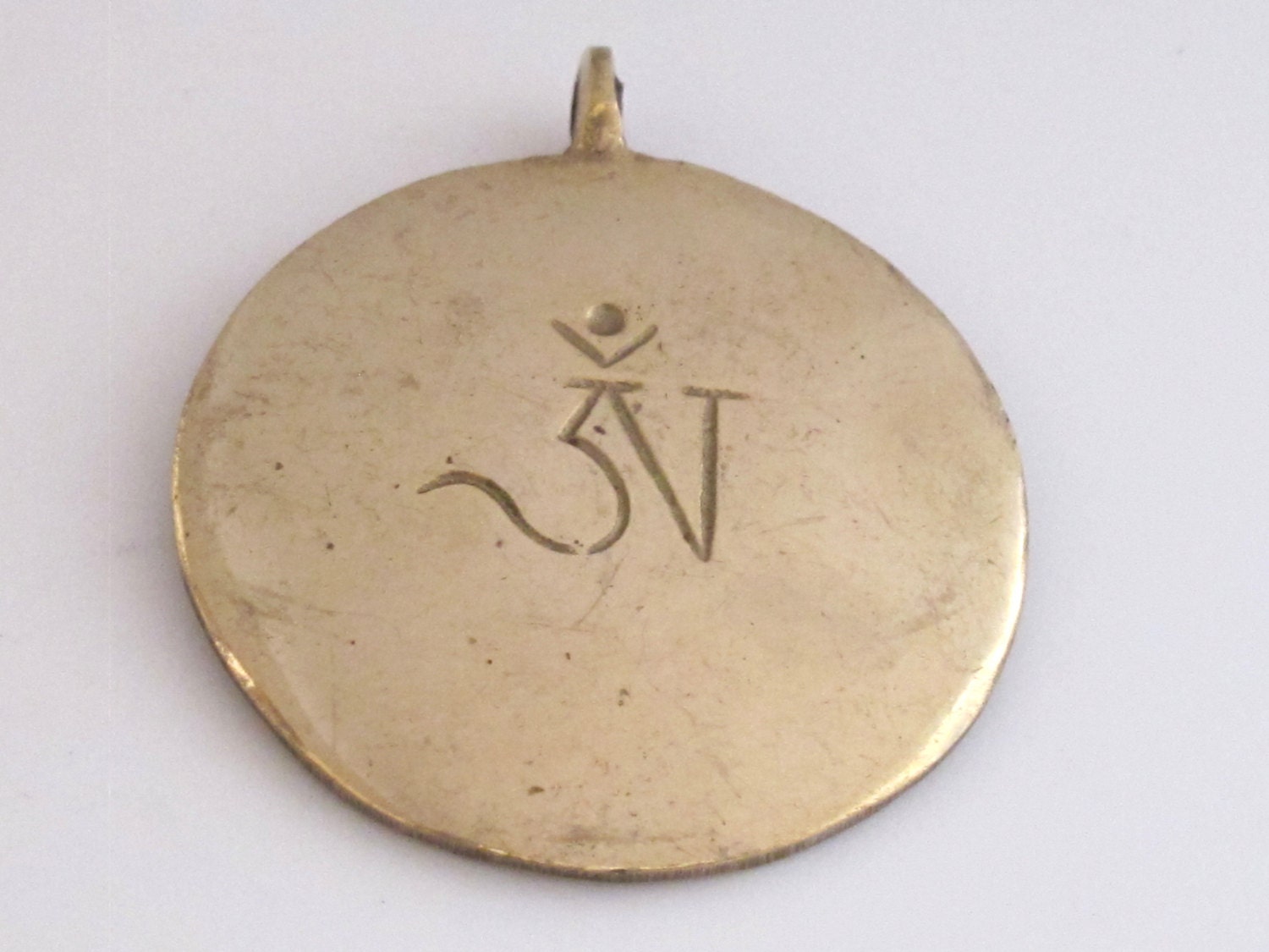 Tibetan Om with calendar timeline wheel Solid Brass pendant 50 mm height x 43 mm wide - CP051 custom design copyright Nepalbeadshop