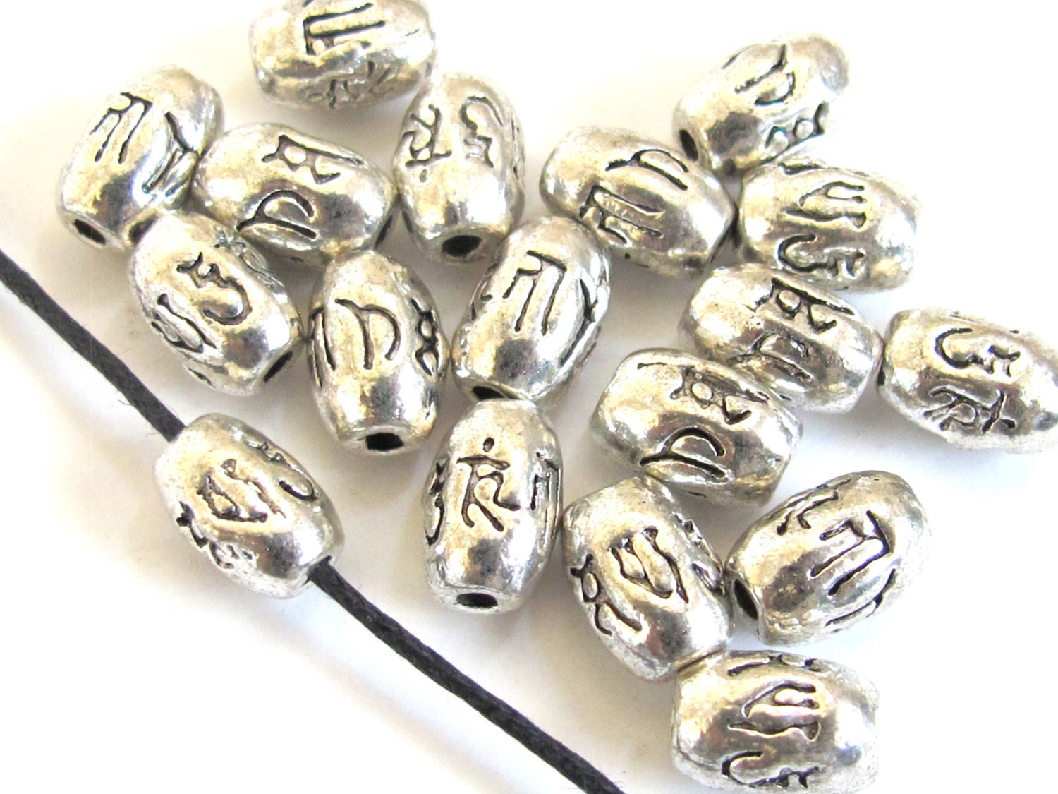 4 BEADS - Tibetan om mantra etched silver tone metal beads 9 mm x 6 mm - BD605