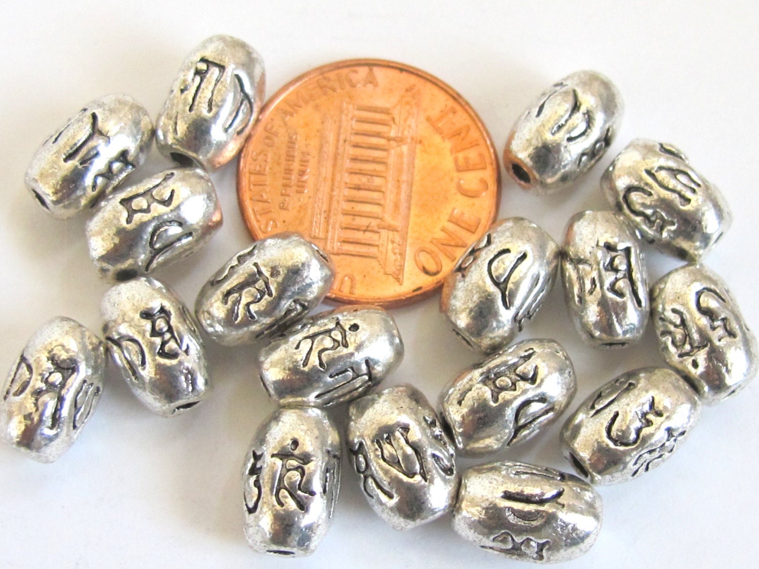4 BEADS - Tibetan om mantra etched silver tone metal beads 9 mm x 6 mm - BD605