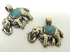 Small Elephant shape reversible Tibetan repousse pendant with turquoise inlay - PM254B