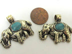 Small Elephant shape reversible Tibetan repousse pendant with turquoise inlay - PM254B