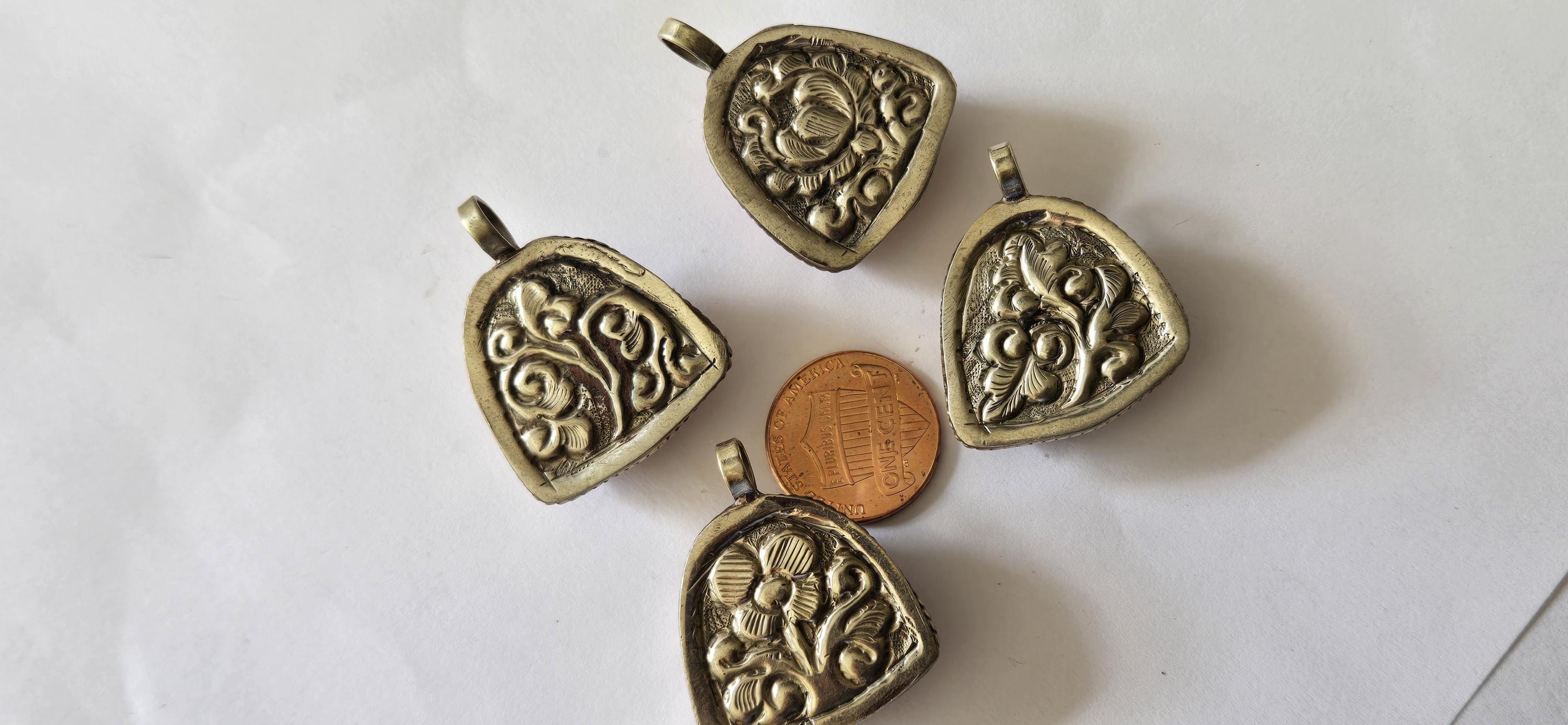 Tibetan antiqued silver color encased howlite happy Buddha face focal pendant floral carving - PM001B