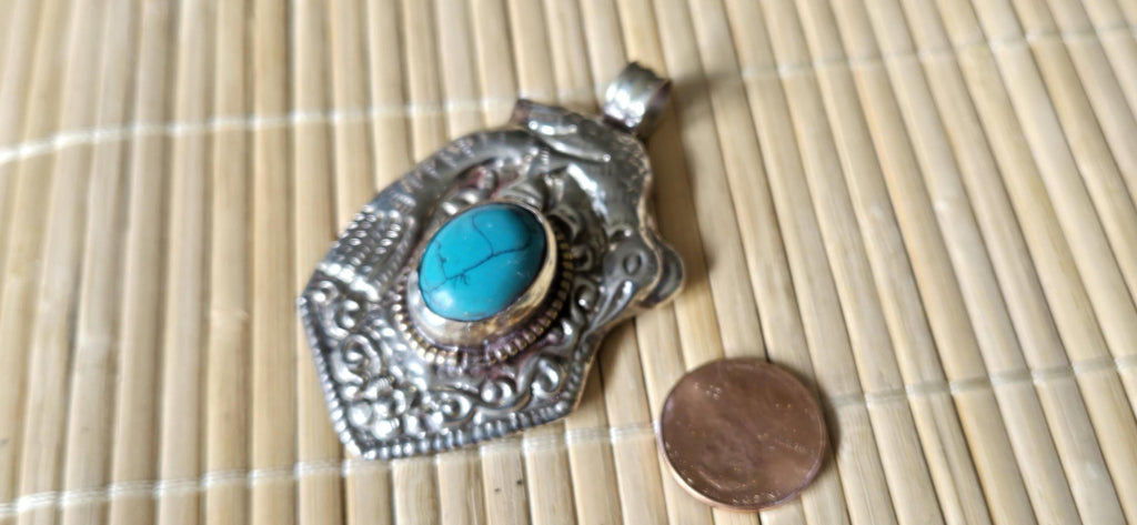 Tibetan silver repousse phoenix bird reversible inlaid with turquoise dragon carving on reverse side Nepal pendants - PM278G
