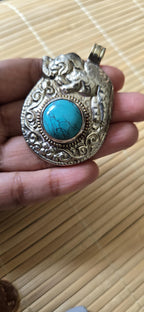 Tibetan silver repousse elephan inlaid with turquoise phoenix carving on reverse side Nepal pendants - PM278H