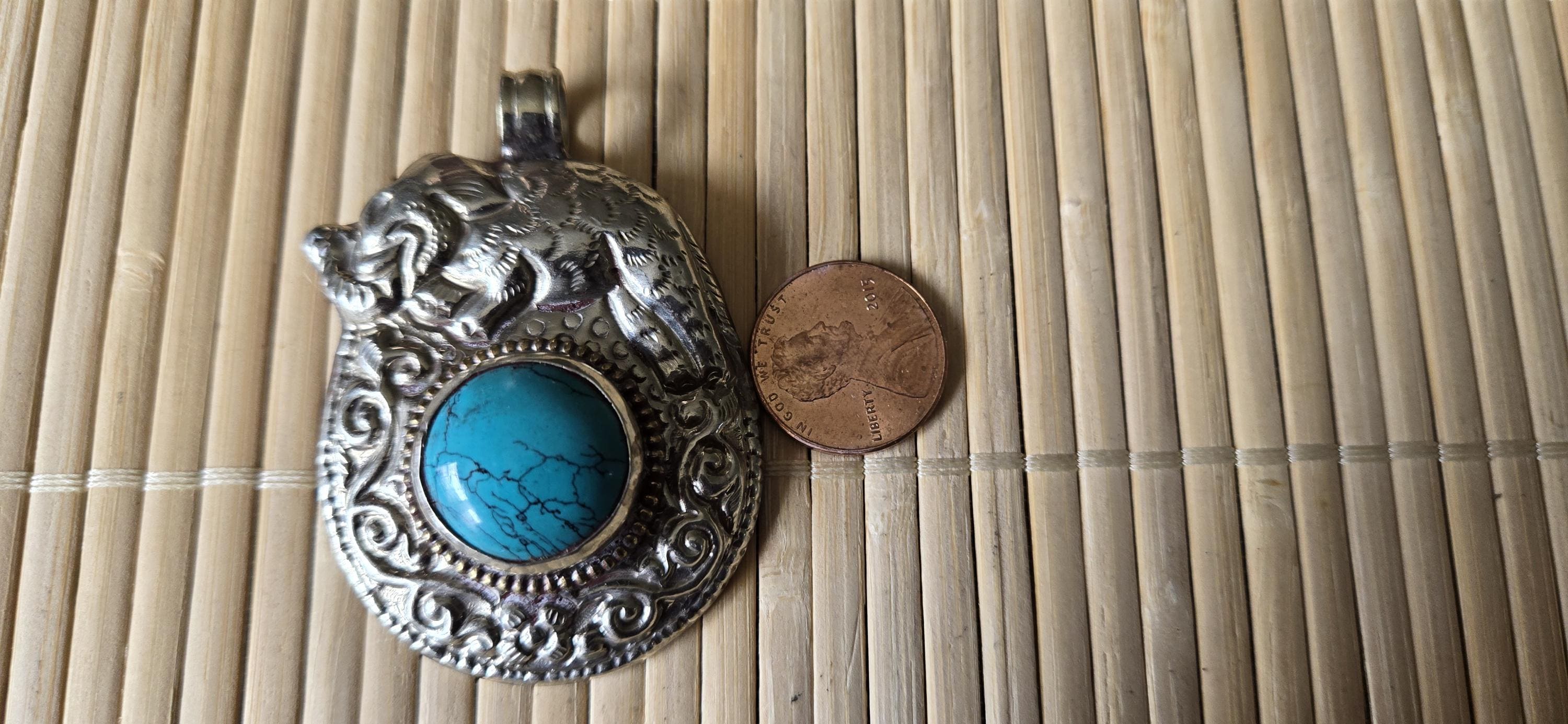 Tibetan silver repousse elephan inlaid with turquoise phoenix carving on reverse side Nepal pendants - PM278H