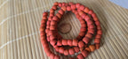 Ethnic nepali reddish orange salmon sherpa glass beads strand from Nepal -BD944G