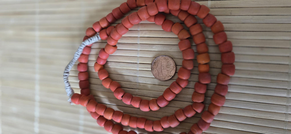 Ethnic nepali reddish orange salmon sherpa glass beads strand from Nepal -BD944G
