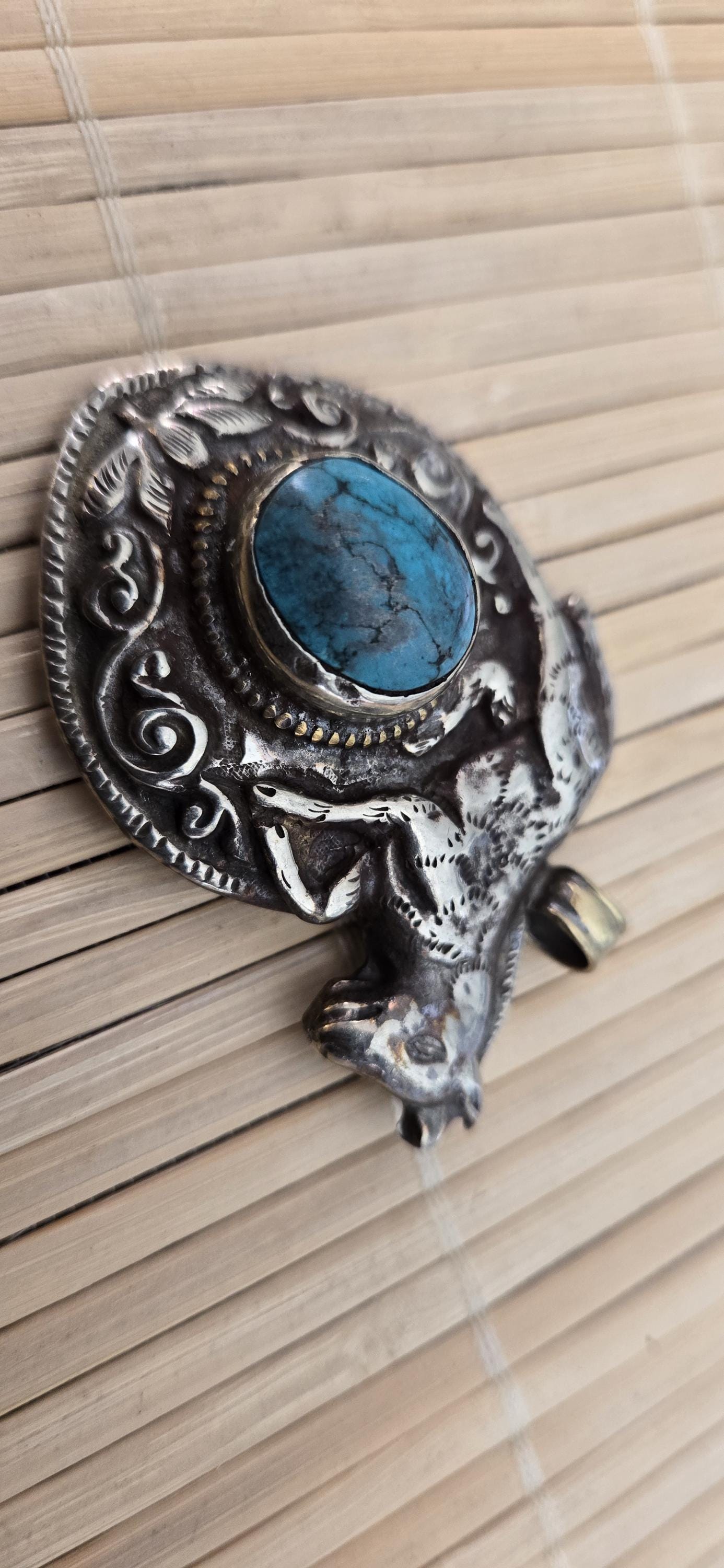 Tibetan silver repousse Horse pendant inlaid with turquoise inlay and reverse side monkey repousse design - PM278B