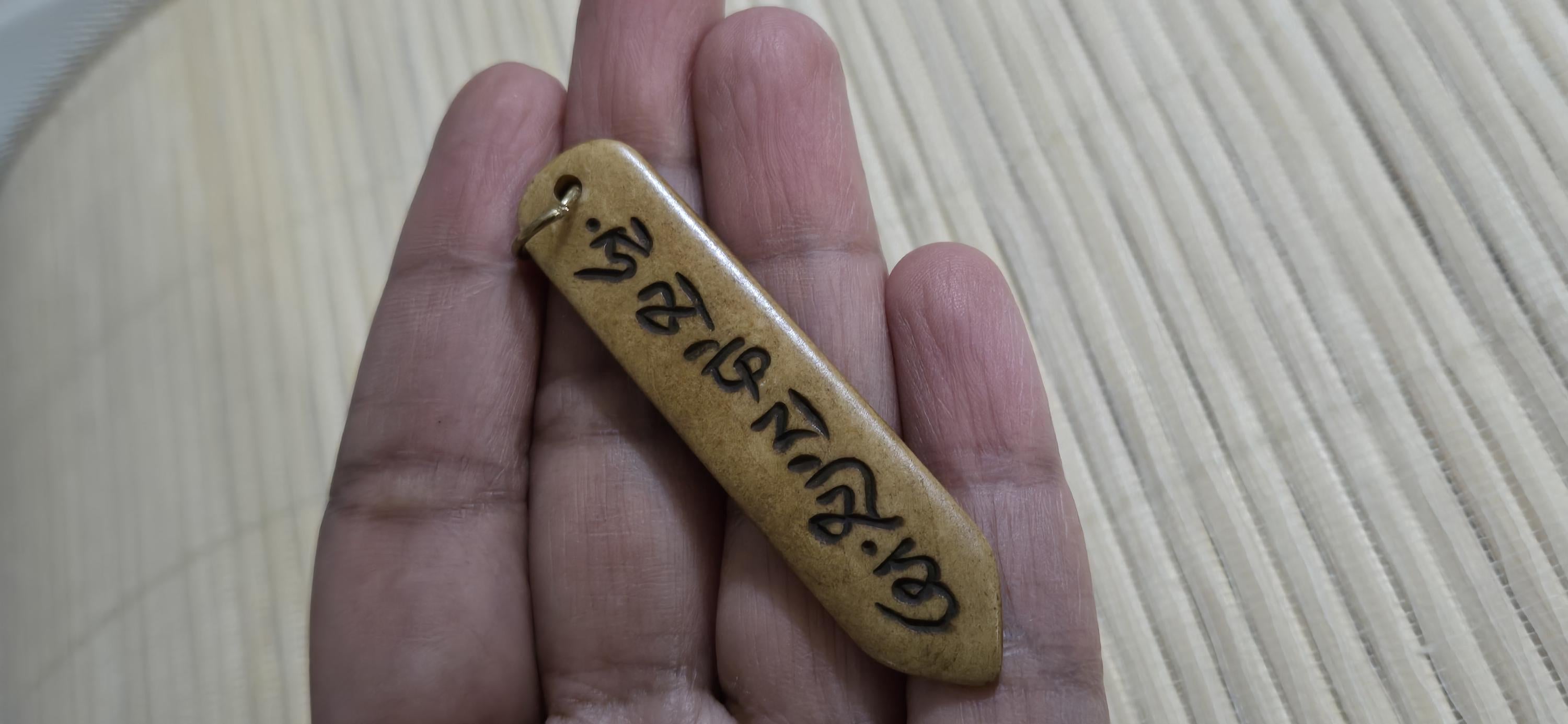 Tibetan prayer mantra Om Mani Padme Hum Pendant – Rectangular Arrowhead shape, Recycled Cattle Bone om amulet charm – 1 pendant - PB053B