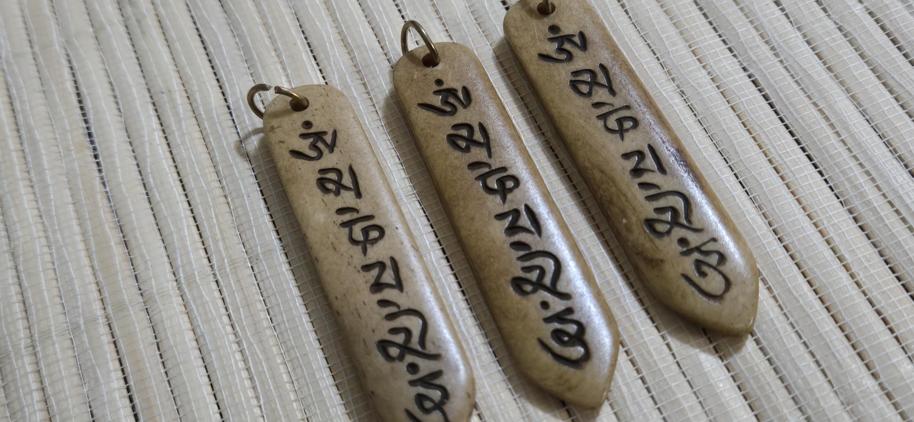 Tibetan prayer mantra Om Mani Padme Hum Pendant – Rectangular Arrowhead shape, Recycled Cattle Bone om amulet charm – 1 pendant - PB053B