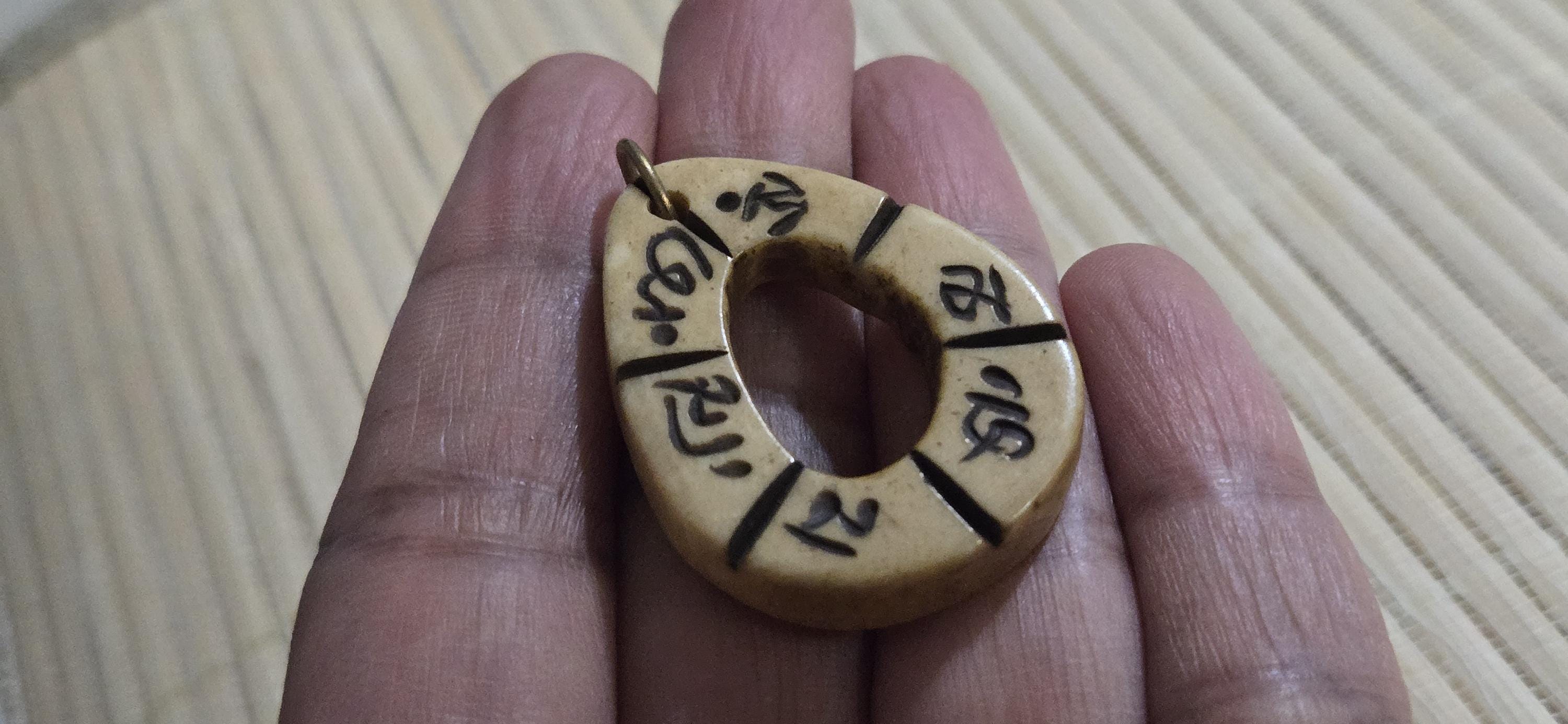 Tibetan prayer mantra Om Mani Padme Hum Pendant – teardrop oval donut shape, Recycled Cattle Bone om amulet charm – 1 pendant - PB051A