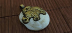 Majestic Elephant & Phoenix bird Pendant | Reversible Tibetan Conch Shell Amulet | Brass Trim Ethnic artistic pendant from Nepal PM004D