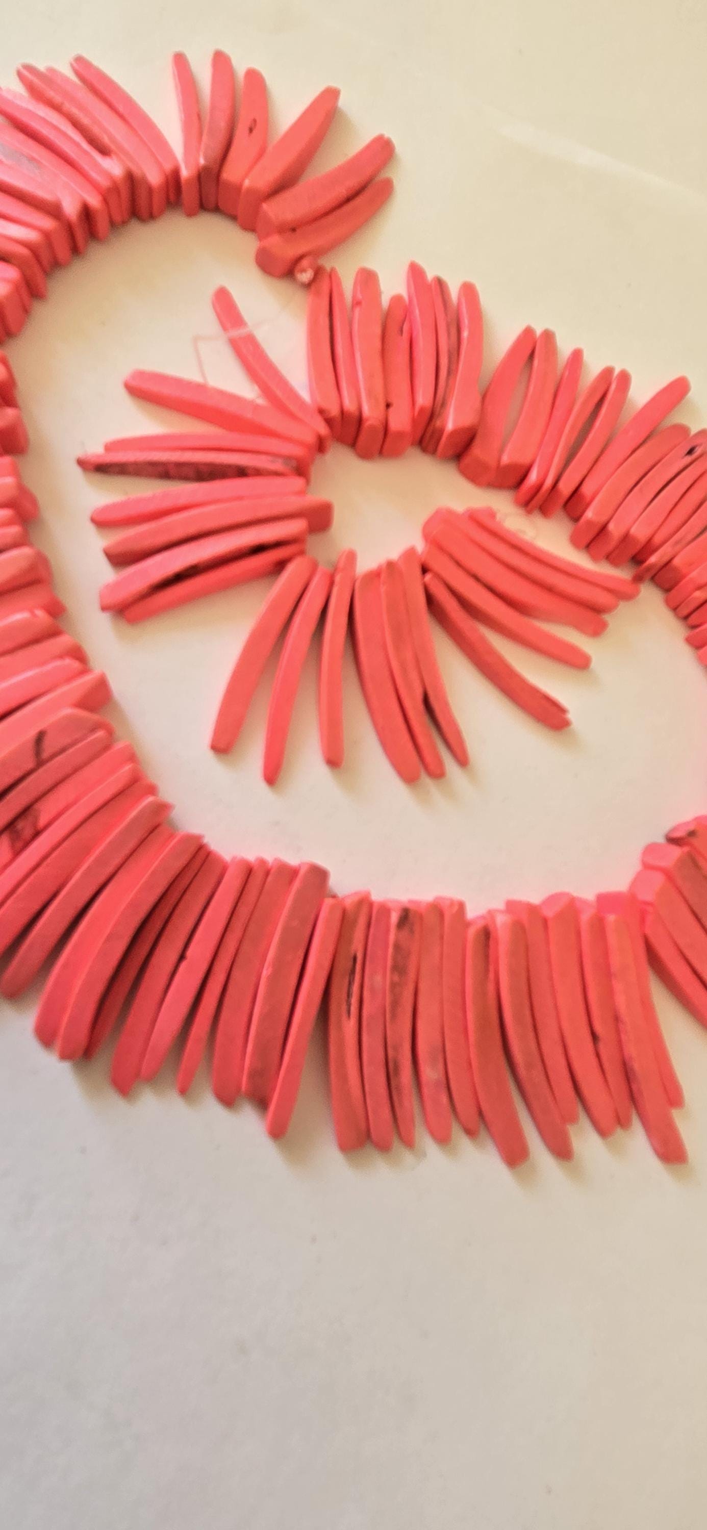 Salmon pink coconut sticks Full Strand 15 inches - 100 plus sticks - NB036M