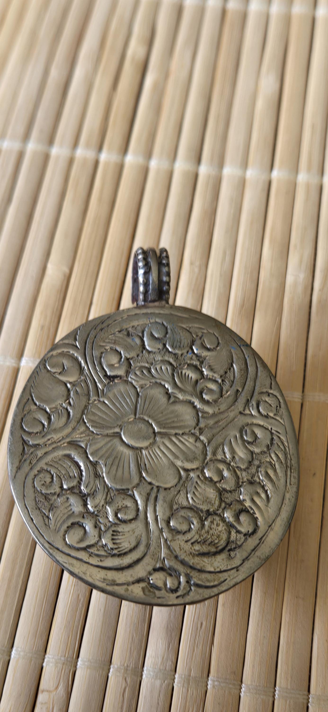 Tibetan silver blue Ganesha pendant with Fish symbol on side and floral repousse on reverse - PM272K