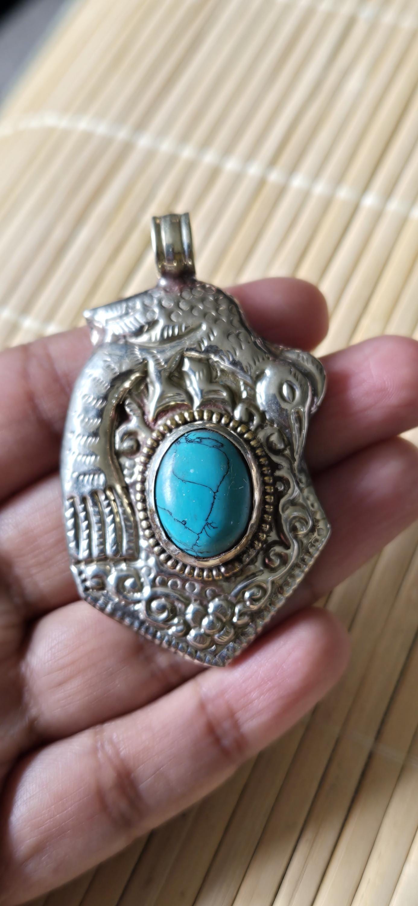 Tibetan silver repousse phoenix bird reversible inlaid with turquoise dragon carving on reverse side Nepal pendants - PM278G