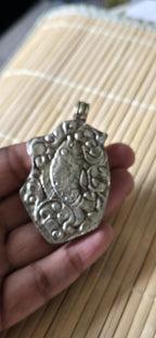 Tibetan silver repousse phoenix bird reversible inlaid with turquoise dragon carving on reverse side Nepal pendants - PM278G