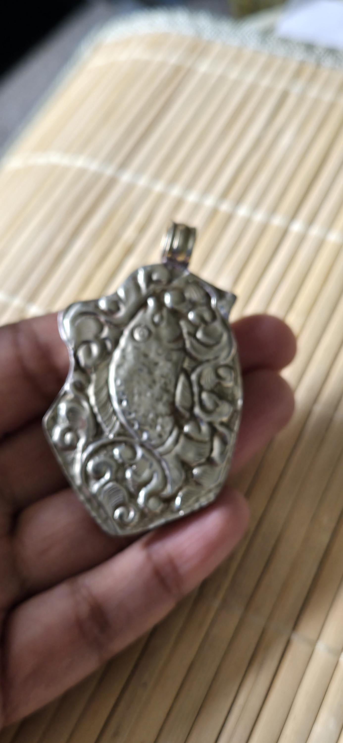Tibetan silver repousse phoenix bird reversible inlaid with turquoise dragon carving on reverse side Nepal pendants - PM278G