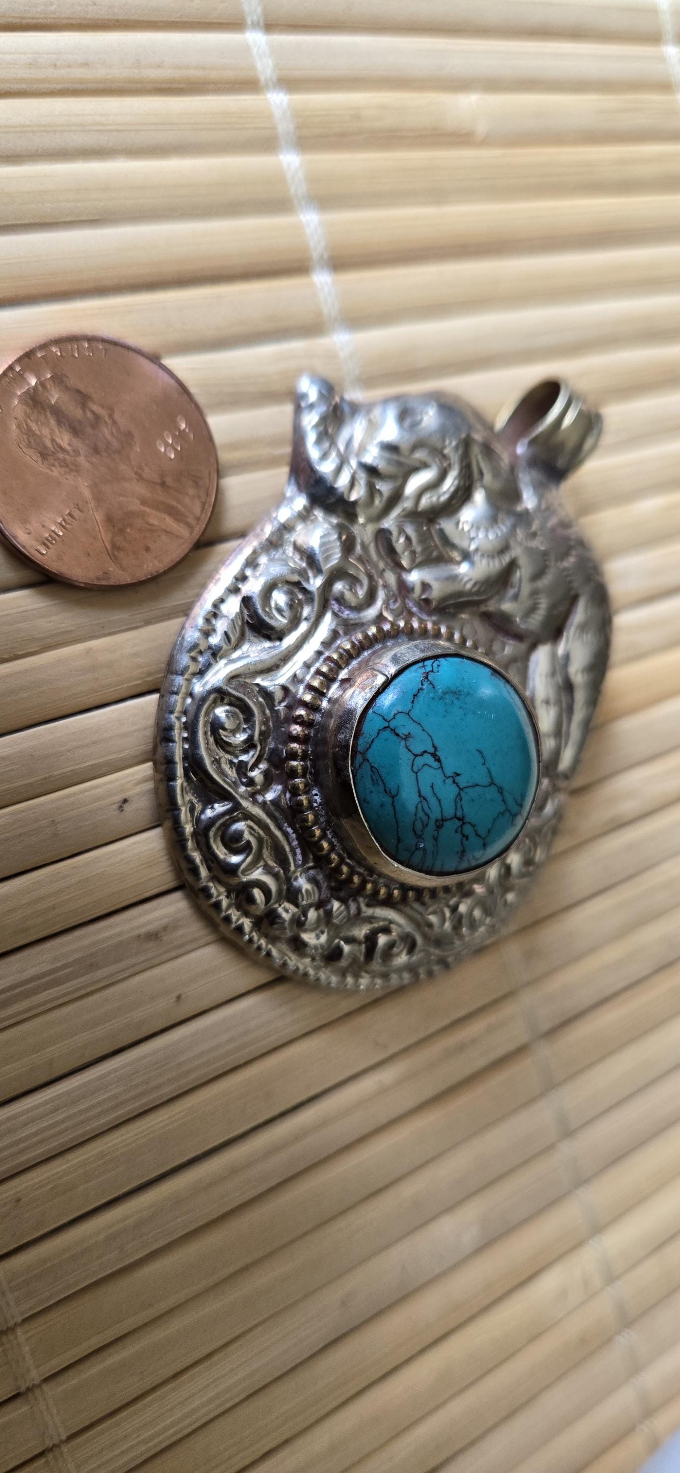 Tibetan silver repousse elephan inlaid with turquoise phoenix carving on reverse side Nepal pendants - PM278H