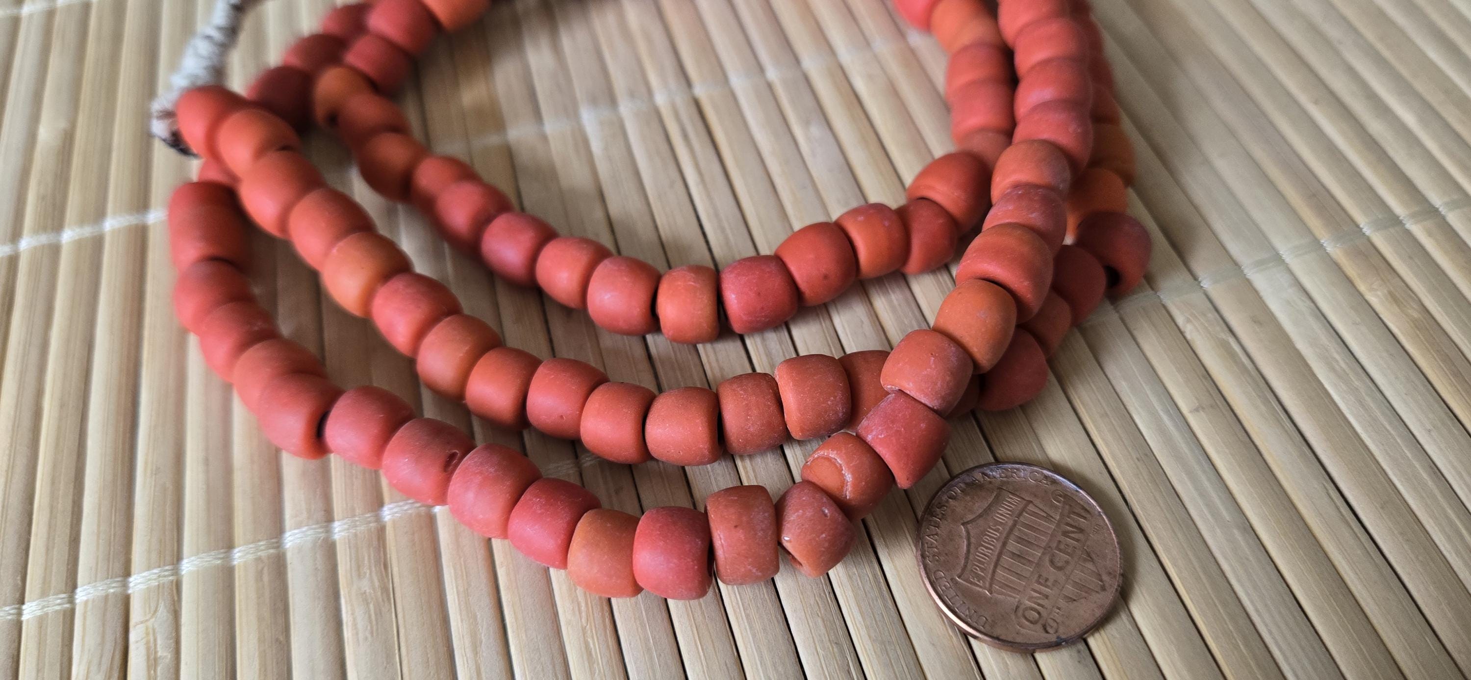 Ethnic nepali reddish orange salmon sherpa glass beads strand from Nepal -BD944G