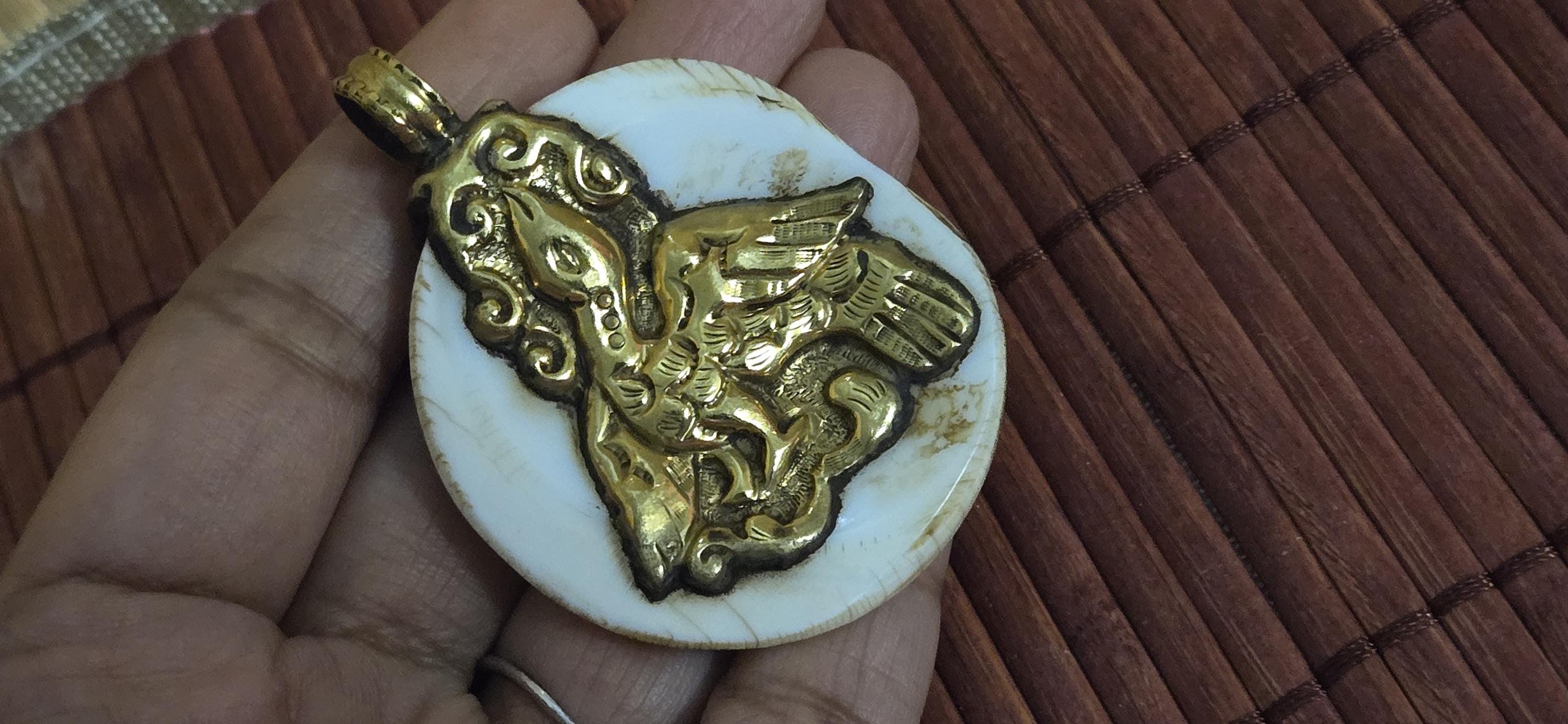 Majestic Elephant & Phoenix bird Pendant | Reversible Tibetan Conch Shell Amulet | Brass Trim Ethnic artistic pendant from Nepal PM004D