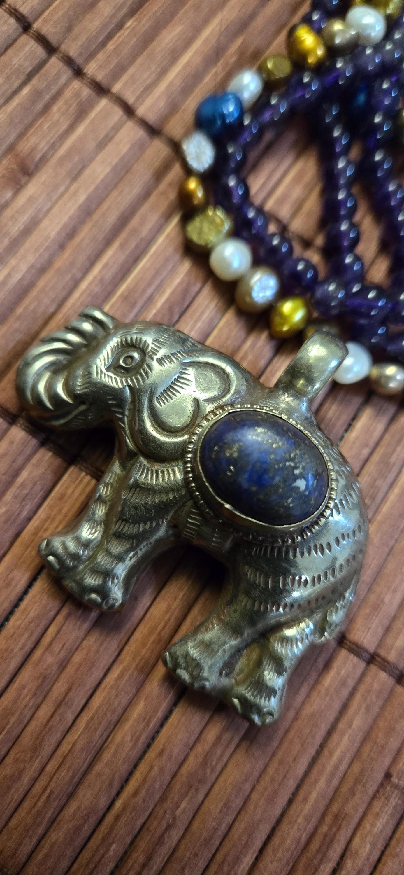 Tibetan Elephant Pendant with lapis gemstone inlay | Repousse Jewelry from Nepal | Bold Animal pendant PM438J